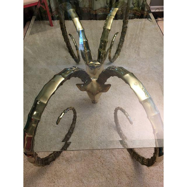 Brass rams head table top side view