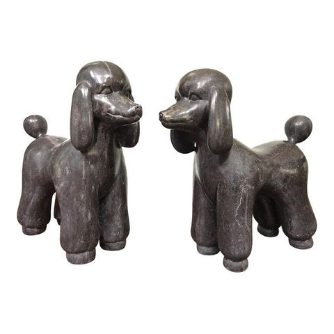 Pair of black marble poodle statues