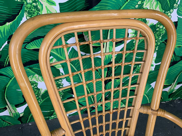 Set of Four Rattan Fan Back Arm Chairs close up